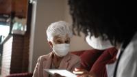 Female patient speaks with female doctor